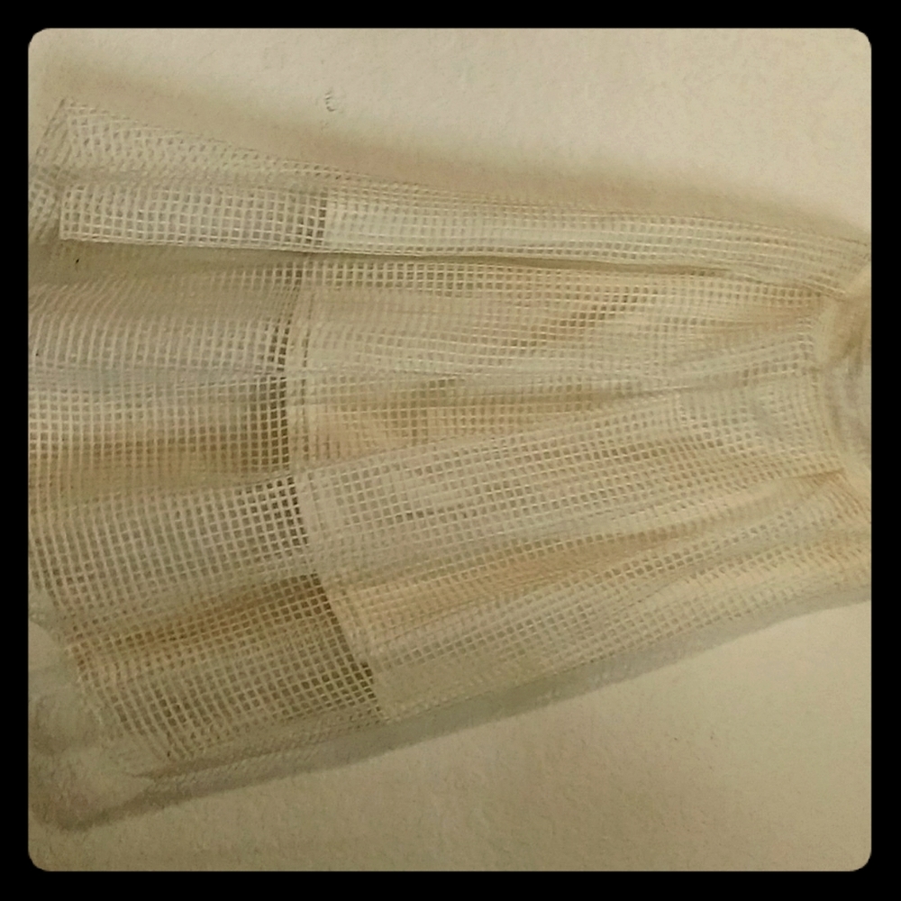 Mesh skirt with undershirt.